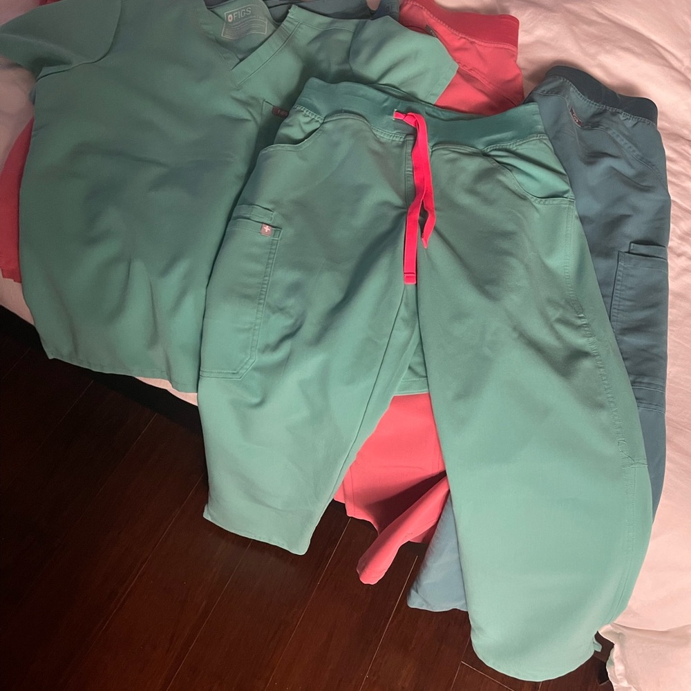Bundle of figs 4 tops, and 3 pants